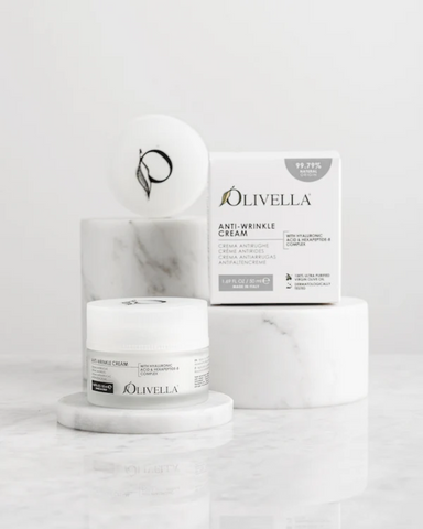 Olivella anti-wrinkle cream jar and packaging on a white background