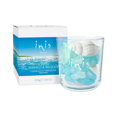 Inis home scented candle with seashells and sea glass packaging on a white background